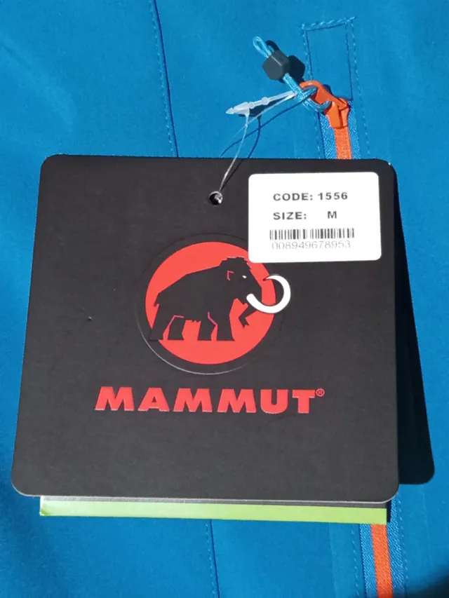 Chaqueta Mammut azul y naranja