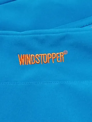 Chaqueta Mammut azul y naranja