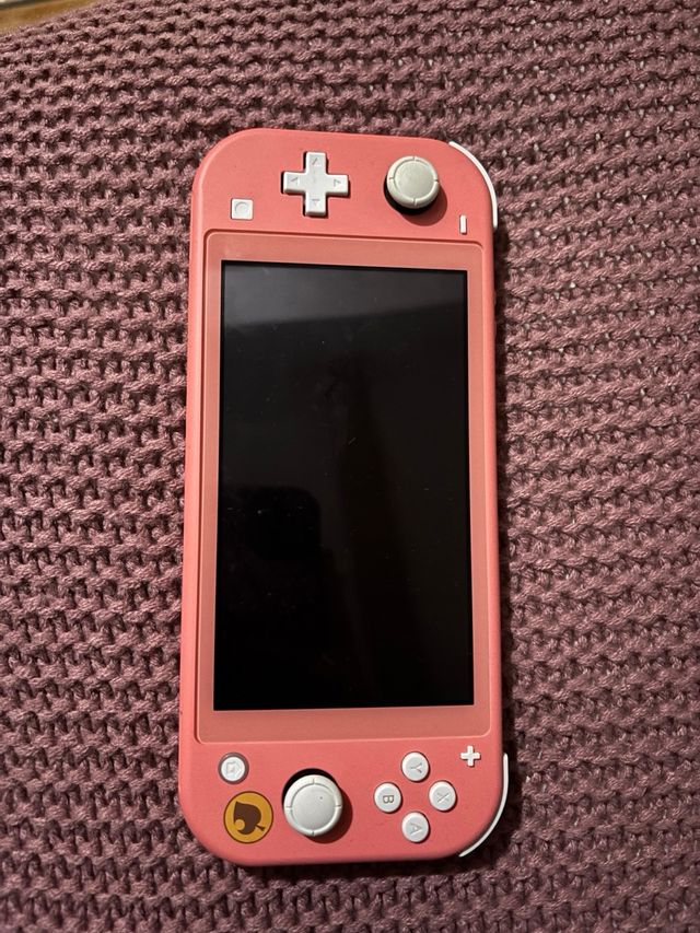 Nintendo Switch Lite Coral Versión Animal Crossing