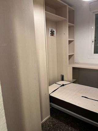 Dormitorio completo con cama abatible
