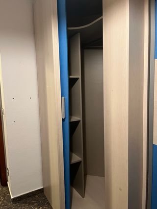 Dormitorio completo con cama abatible