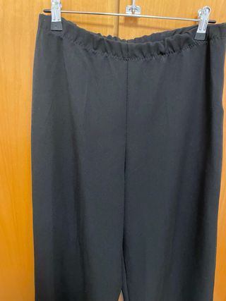 Pantalón negro ancho con vuelta