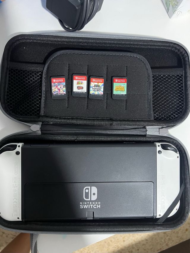Nintendo Switch Gris/Blanco + 4 Juegos