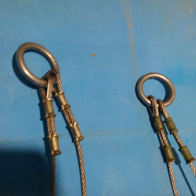 Arneses de seguridad con mosquetones. Acero inox.