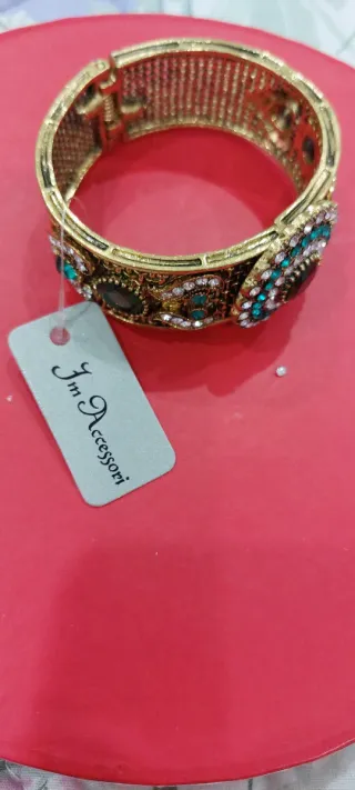 Bracciale donna oro con pietre verdi