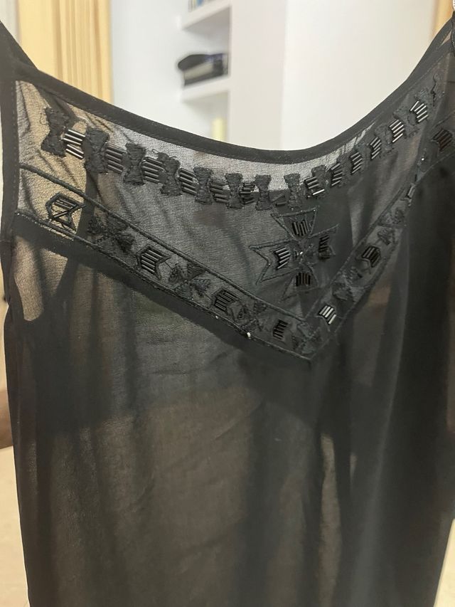 Dos tops negros talla OS