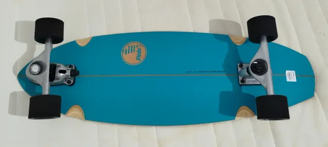 Surfskate azul con diseño de tabla de surf