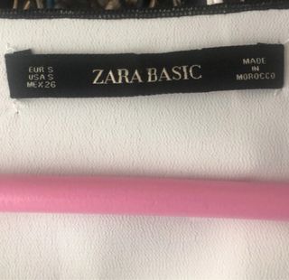 Blusa Zara asimétrica con ribetes