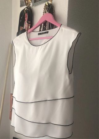Blusa Zara asimétrica con ribetes