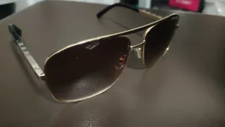 Gafas de sol Louis Vuitton doradas y marrones