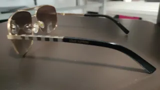 Gafas de sol Louis Vuitton doradas y marrones