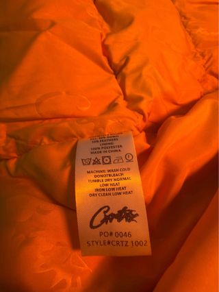 Plumas negra con forro amarillo Talla M