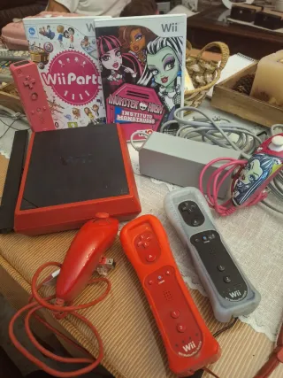 Consola Wii con mandos y juegos