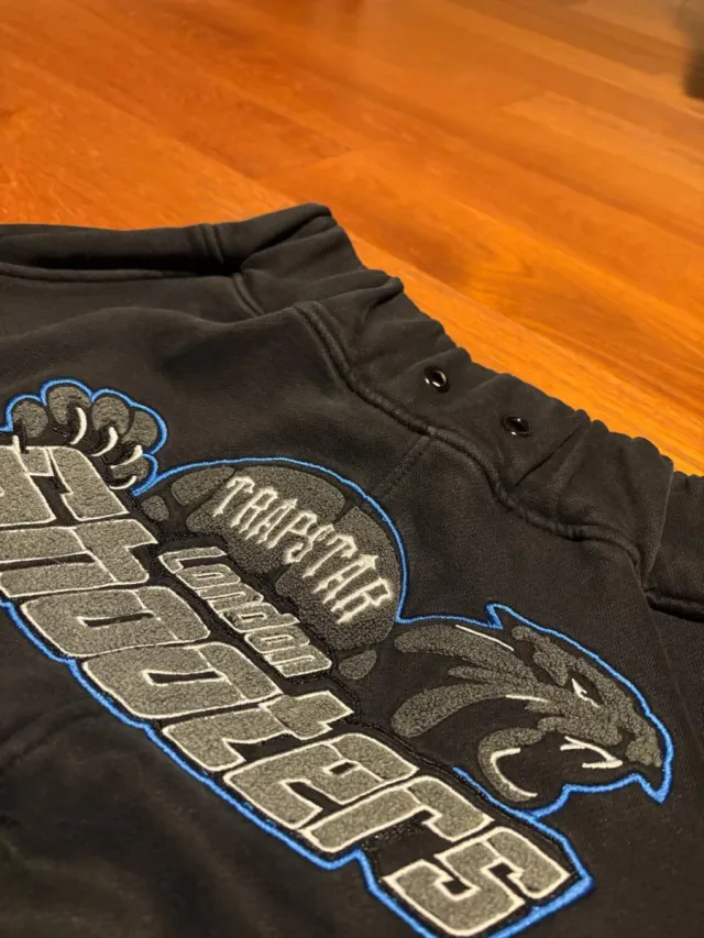 Tuta Trapstar Shooters nera e blu