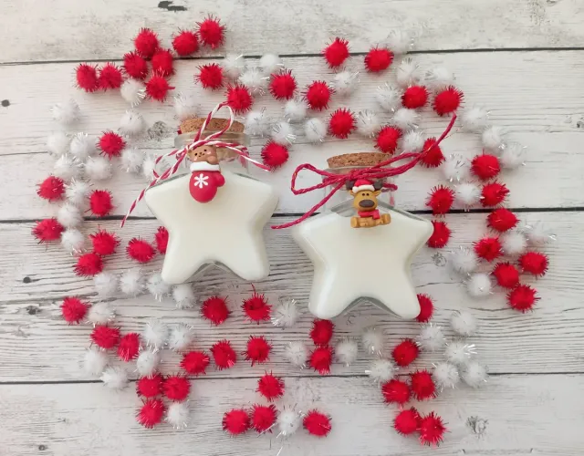 Candela a forma di stella profumata all'arancia