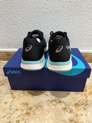 Zapatillas mujerASICS negras y turquesa GEL-EXAT 4