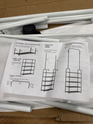 Carrello per vestiti con ruote in metallo