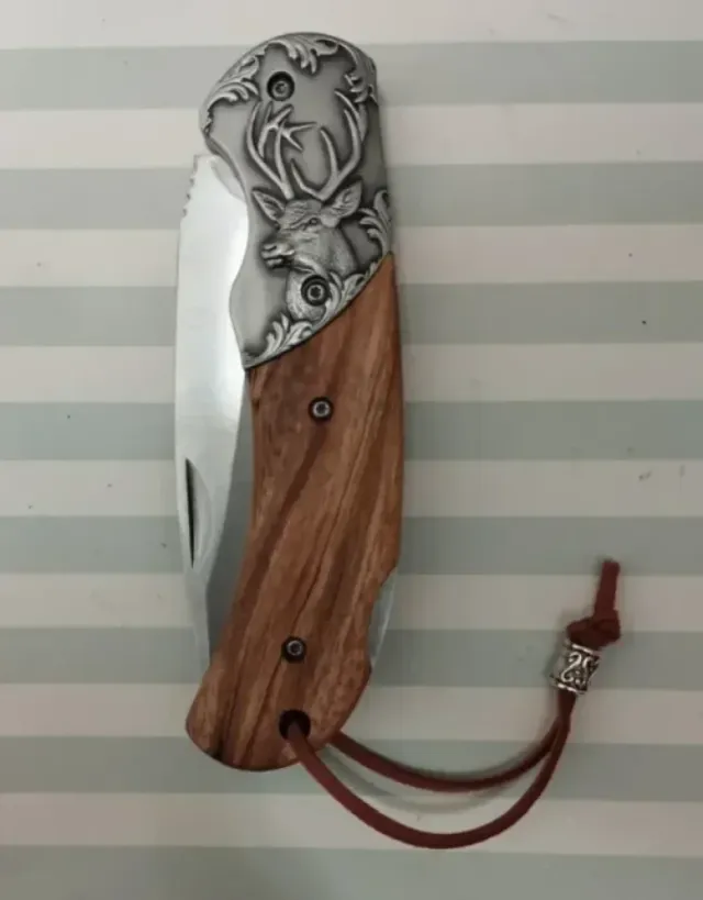 REBAJADA CON FUNDA DE REGALO. MADERA VIROLA CIERVO