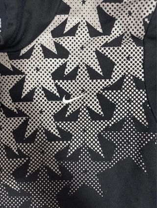 Sudadera Nike Negra con Estrellas Plateadas