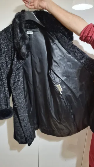 Pelliccia ecologica Astrakan nera