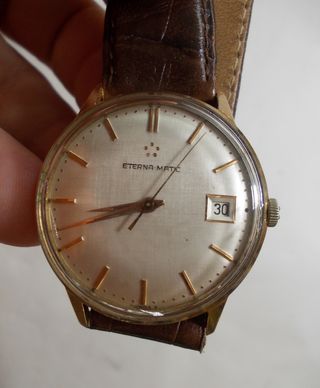 Reloj Eterna-Matic de oro de ley