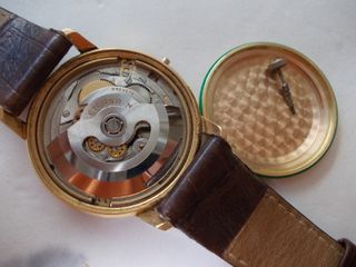 Reloj Eterna-Matic de oro de ley