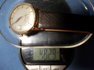 Reloj Eterna-Matic de oro de ley