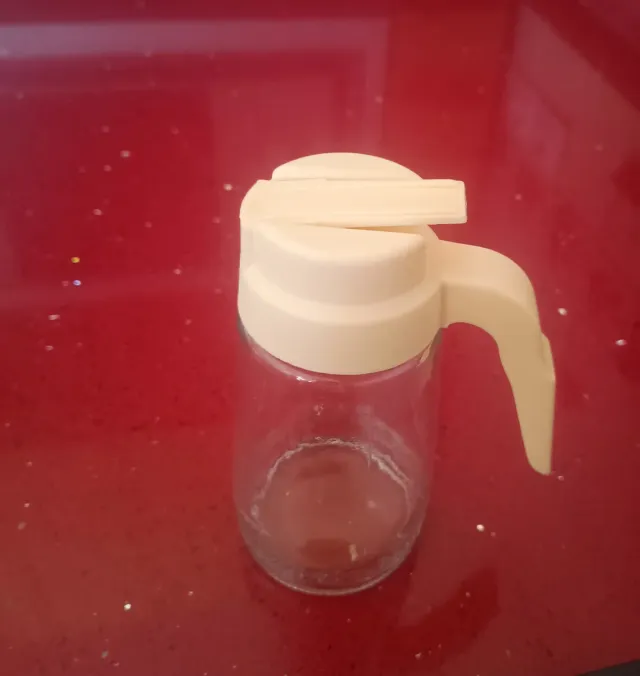 Jarra para miel de cristal y plástico