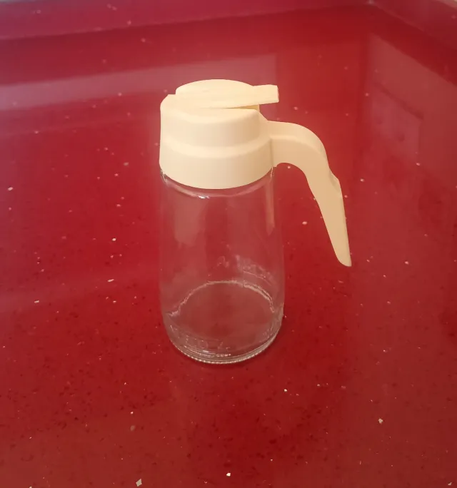 Jarra para miel de cristal y plástico