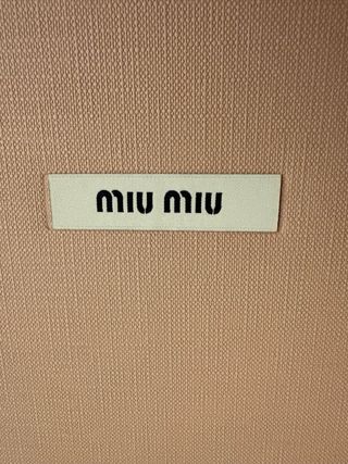 Busta e scatola Miu Miu