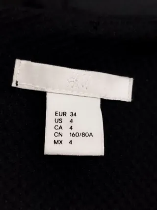 Mono corto negro. Trend Collection H&M.