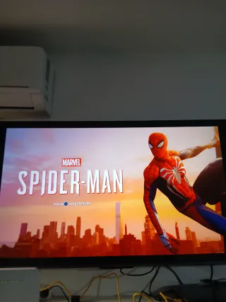 PS4 Slim Negra + 5 Juegos y Mando