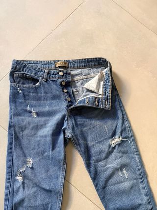 Jeans uomo strappati blu taglia 44