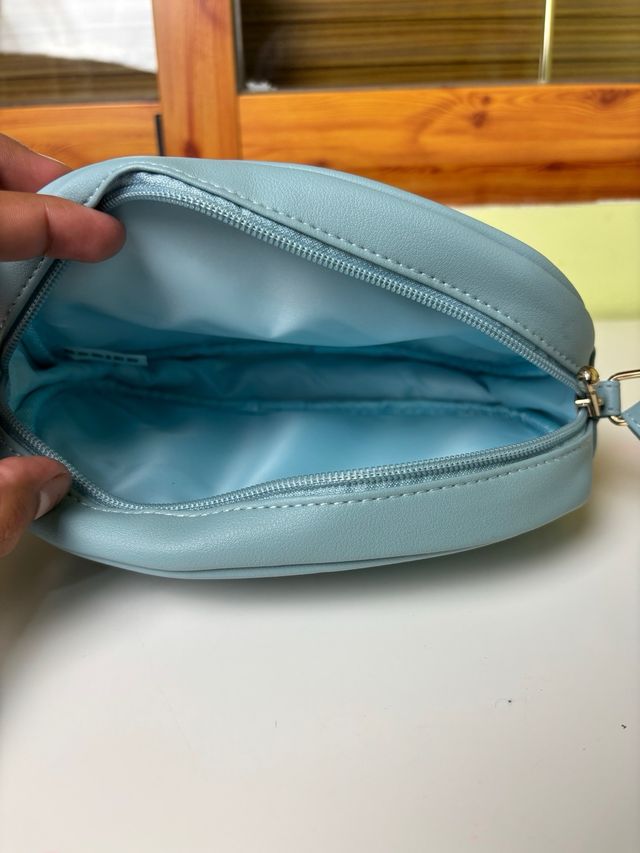 Bolso bandolera Rodier azul celeste acolchado