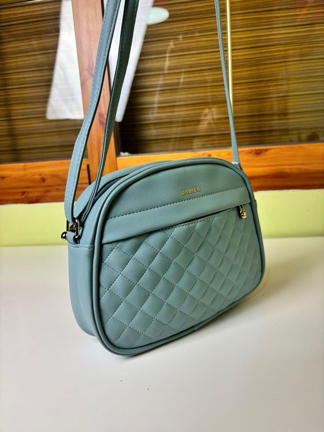 Bolso bandolera Rodier azul celeste acolchado