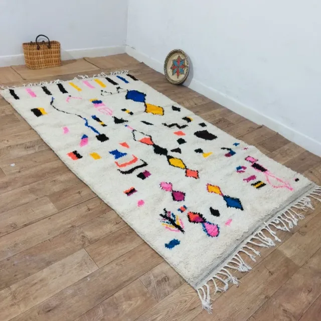 Alfombra de lana multicolor con diseño geométrico