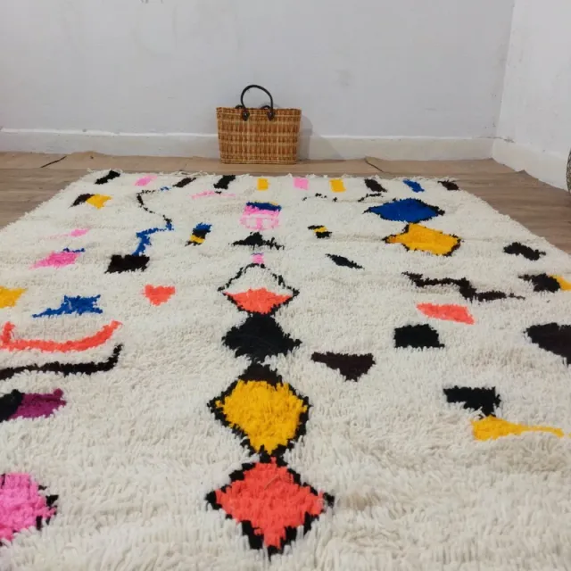 Alfombra de lana multicolor con diseño geométrico