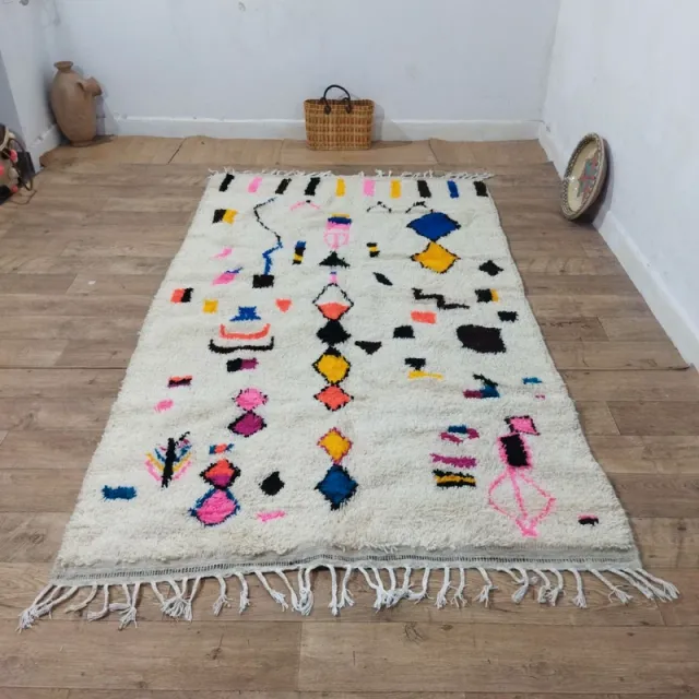 Alfombra de lana multicolor con diseño geométrico