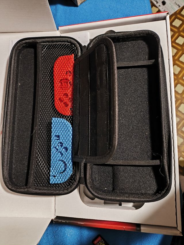 Nintendo Switch 1 V2 con funda y dock