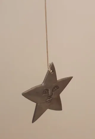 Campana a vento con sole e stella