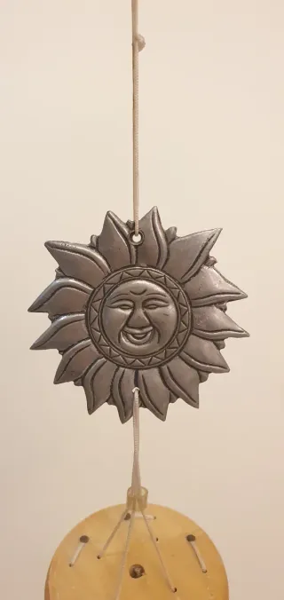 Campana a vento con sole e stella