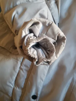 Piumino lungo ghiaccio con cappuccio