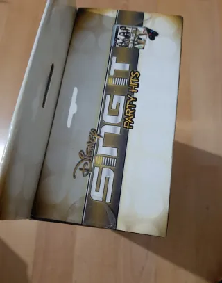 Disney Sing It Party Hits PS3 con micrófonos