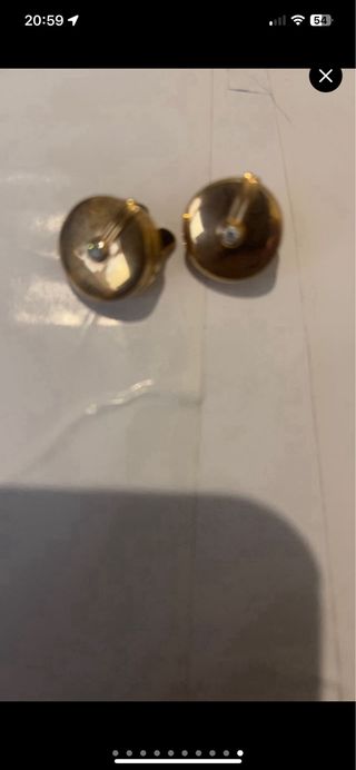 22 pares de gemelos: plata y negro y dorados