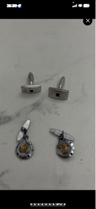 22 pares de gemelos: plata y negro y dorados