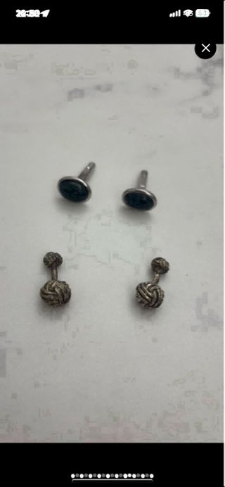 22 pares de gemelos: plata y negro y dorados