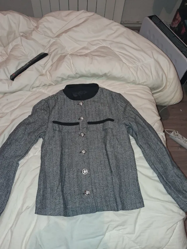 Chaqueta espiga cuello redondo