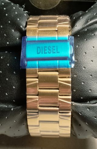 Reloj Diesel Spiked dorado y verde