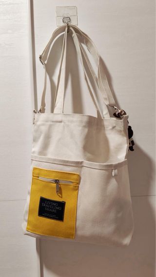 Bolso de lona blanco y amarillo