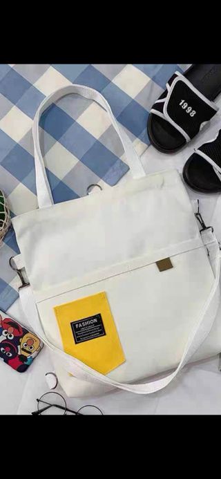 Bolso de lona blanco y amarillo